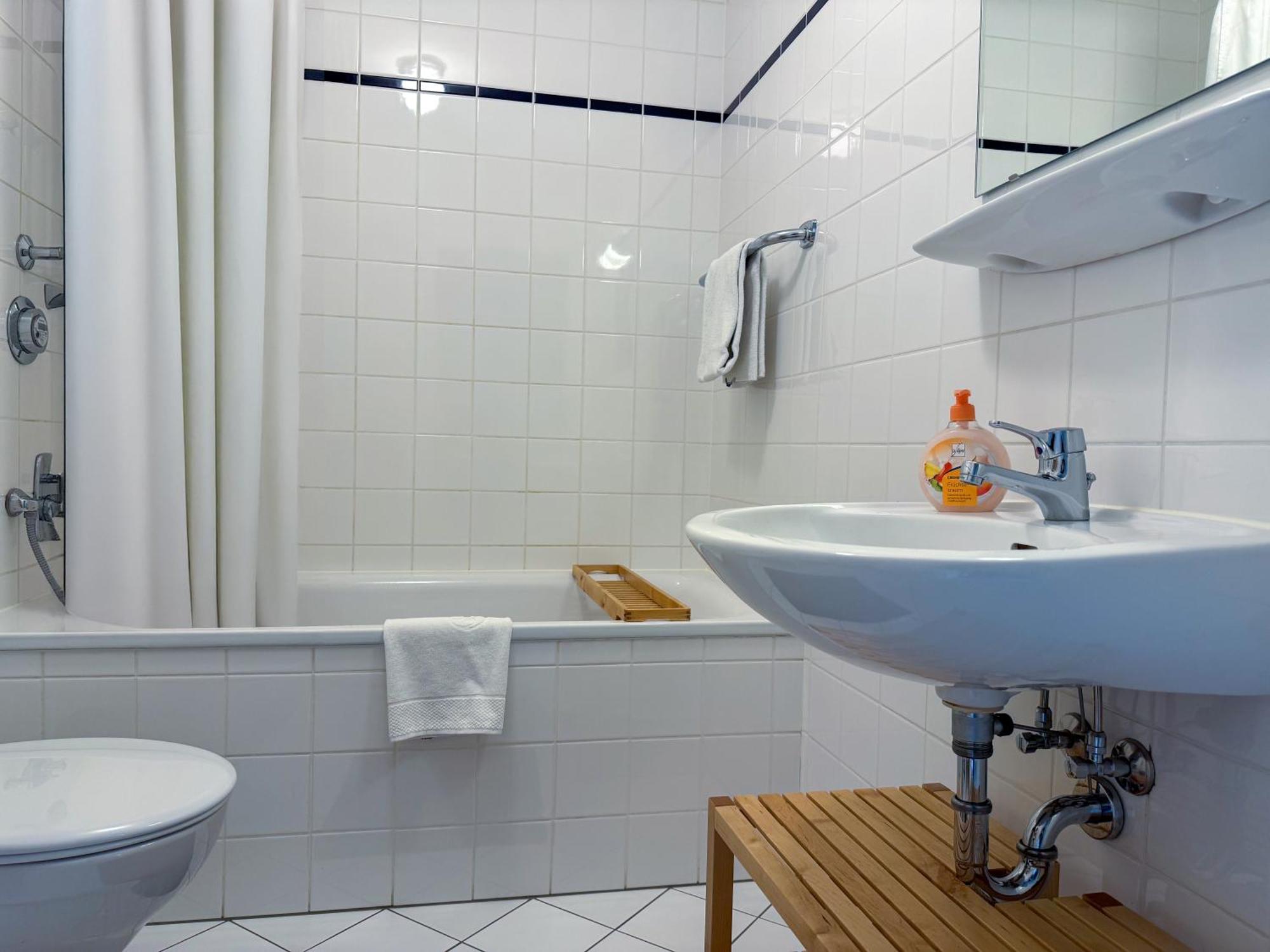 Alexxanders Apartments & Studios Кемниц Стая снимка